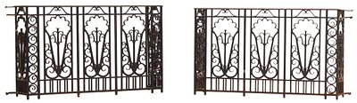 A GOOD PAIR OF FRENCH ART DECO IRON BALCONY PANELS IN THE MANNER OF EDGAR BRANDT C 1930. A good 