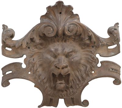 BRONZE FOUNTAIN HEAD IN THE FORM OF A LION MASK C 1920. Bronze fountain head in the form of a 