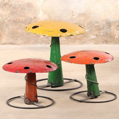 THREE PAINTED IRON MUSHROOM FORM GARDEN SCULPTURES. Three painted iron mushroom form garden 