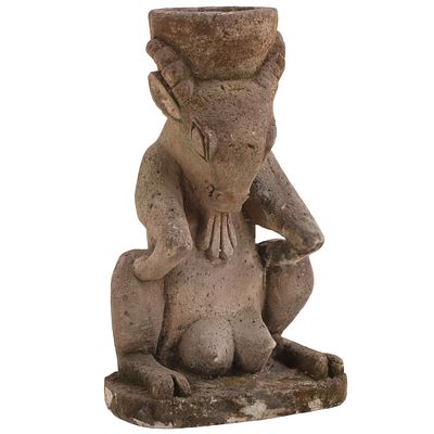 A CARVED STONE FANTASTICAL GAZELLE PLANTER C 1960. A carved stone fantastical Gazelle planter 