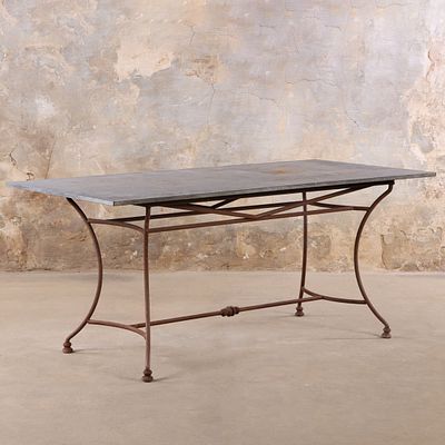 FRENCH IRON AND BLUE STONE TOP GARDEN TABLE. French iron and blue stone top garden table. Ht: 