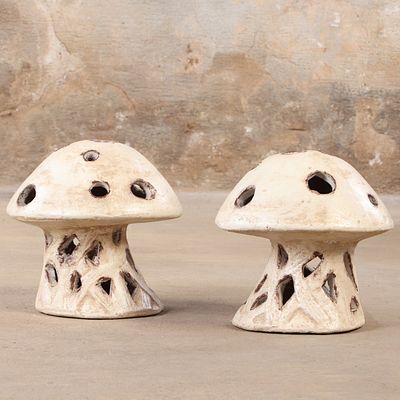 PAIR OF GLAZED TERRACOTTA MUSHROOMS. Pair of glazed terracotta mushrooms. Ht: 13" Wd: 12" Dpth: 