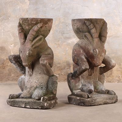 PAIR OF CARVED STONE FANTASTICAL GAZELLE PLANTERS. Pair of carved stone fantastical gazelle 