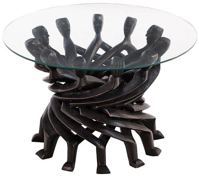 WOOD AND GLASS COFFEE TABLE HAVING A SERIES OF INTERLOCKING STYLIZED HUMAN FIGURES CARVED FROM. W 