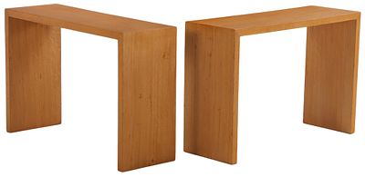 A PAIR OF OAK CONSOLE TABLES IN THE MANNER OF JEAN-MICHEL FRANK. A pair of oak console tables 