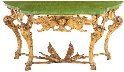ITALIAN CARVED AND GILTWOOD CONSOLE TABLE MADE FORM EIGHTEENTH CENTURY ELEMENTS HAVING A LATER. I 