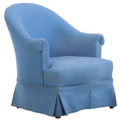 A SKIRTED FRENCH UPHOLSTERED LOUNGE CHAIR HAVING CONTINUOUS BACK CIRCA 1940. A skirted French 