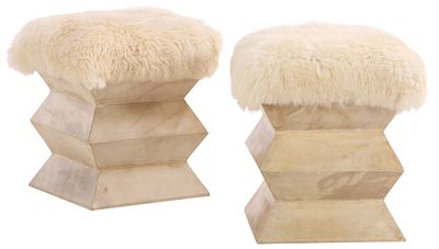 A PAIR OF PARCHMENT COVERED STOOLS UPHOLSTERED IN FAUX FUR. A pair of parchment covered stools 