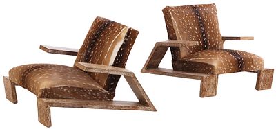 PAIR OF CERUSED OAK AND DEER HIDE ARM CHAIRS IN THE MANNER OF JEAN-MICHEL FRANK. THIS DESIGN WAS. 