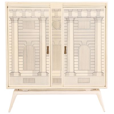 A PAINT DECORATED BAR CABINET IN THE MANNER OF FORNASETTI HAVING MIRRORED UPPER CABINET C 1960. 