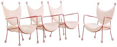 FOUR LARGE PAINTED IRON AND UPHOLSTERED ARM CHAIRS IN THE MANNER OF JEAN ROYERE. Four large 