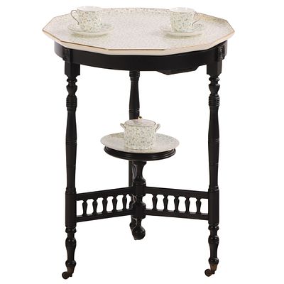 A RARE OCCASIONAL TABLE HAVING OCTAGONAL INSET PORCELAIN TOP AND TEA SET STAMPED WEDGWOOD. A 