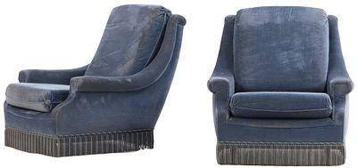 PAIR OF FRENCH UPHOLSTERED LOUNGE CHAIRS HAVING BRASS FEET AND FRINGE DECORATION C 1960. Pair 