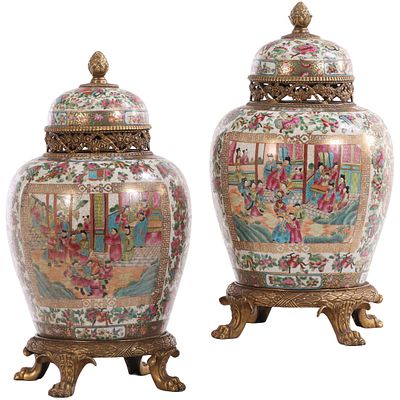 PAIR OF CHINESE BRONZE MOUNTED GINGER JARS HAVING ROSE MEDALLION PATTERN AND FOOTED BASES C LATE. 