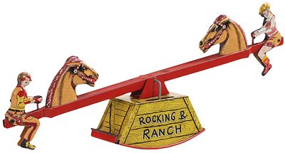 A VINTAGE ROCKING AND RANCH WIND UP TOY. A vintage Rocking and Ranch wind up toy. Ht: 6" Wd: 