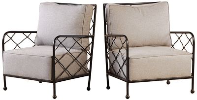 A LARGE PAIR OF PAINTED IRON LOUNGE CHAIRS IN THE MANNER OF JEAN ROYERE HAVING LOOSE CUSHION. A 