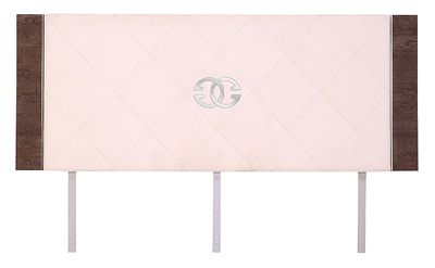 AN UPHOLSTERED KING SIZE HEADBOARD BY GUCCI. An upholstered king size headboard by Gucci. Ht: 