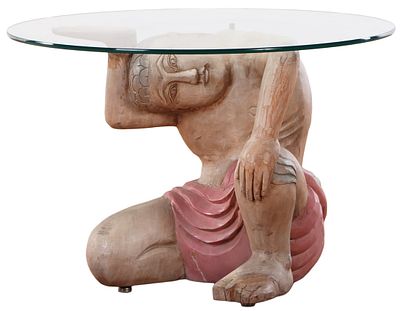 PAINTED AND CARVED WOOD COFFEE TABLE HAVING AN EGYPTIAN FIGURE SUPPORTING A GLASS TOP. Painted 