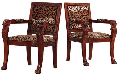 PAIR OF ENGLISH REGENCY STYLE LION CARVED MAHOGANY OPEN ARM CHAIRS WITH FAUX LEOPARD UPHOLSTERY. 