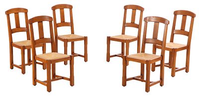 SIX FRENCH OAK AND RUSH CHAIRS IN THE BRUTALIST STYLE C 1945. Six French oak and rush chairs in 