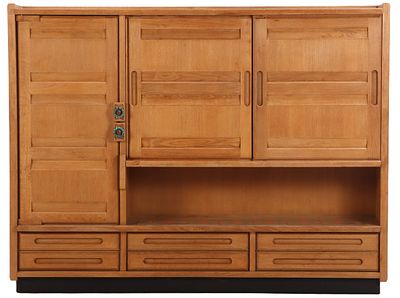 FRENCH OAK CABINET BY CHAMBRON AND GUILLERME C 1960 HAVING TWO SLIDING DOORS AND A SINGLE DOOR. F 