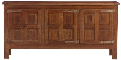 ONE OF TWO FRENCH BRUTALIST STYLE THREE DOOR OAK SIDEBOARDS WITH GEOMETRIC MOTIFS AND IRON STRAP. 