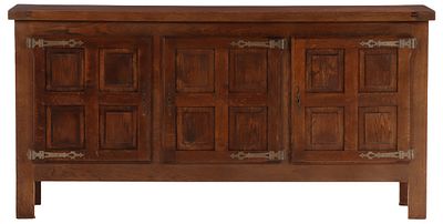 ONE OF TWO FRENCH BRUTALIST STYLE THREE DOOR OAK SIDEBOARDS WITH GEOMETRIC MOTIFS AND IRON STRAP. 