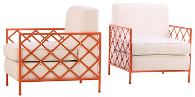 PAIR OF PAINTED IRON AND BRASS LOUNGE CHAIRS WITH LOOSE CUSHION UPHOLSTERY IN THE MANNER OF JEAN. 