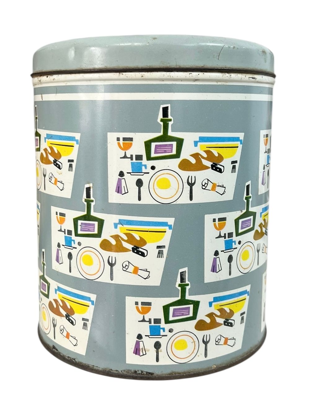 קופסת פח ישראלית לאחסון - וינטג' 
עם איורי אוכל פשוטים וצבעוניים החוזרים על עצמם. 
תוית מס 