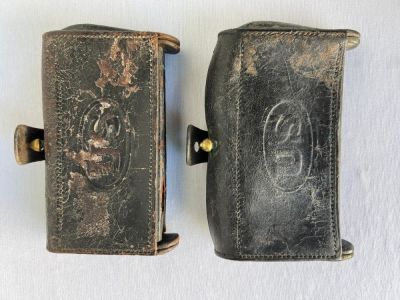 Two Indian Wars Era McKeever Cartridge Boxes showing some wear from age and use, complete with 