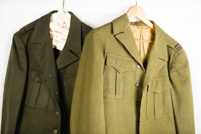 Two Attributed Captains WWII US Officers Ike Jackets. Two World War II era jackets both with 