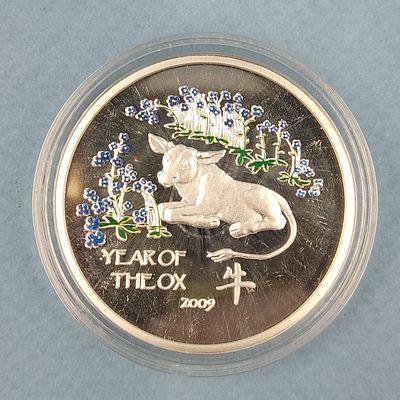 Серебряная монета Острова НИУЭ 2008 г. "Год Быка". Серебро 925 пробы. 
Вес- 28.1 грамм. 