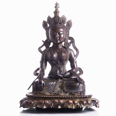 Bronze Tara Buddha Figure Tibet, probably 17th century. Bronze, platinum-plated. H. 32 cm, W. 
