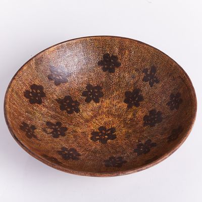A Jizhou ''Papercut Prunus'' Bowl China, Song Dynasty or later. Ceramic, glazed. Interior with 