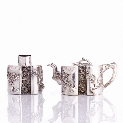 Sterling Silver Teapot and Tea Caddy with Peach Blossom Decor Hong Kong, Qing Dynasty, 19th 