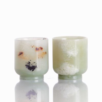 Two Celadon Jade Cups China, Republic Period, 1912-1949. Celadon-colored jade with attractive 