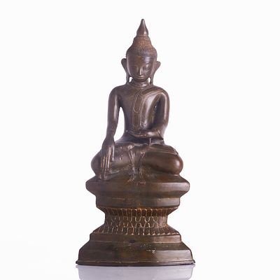Seated Shan Buddha Shakyamuni from Burma (Myanmar) Burma, Shan Period (1315-1948). Bronze with 
