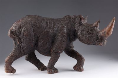 Vintage Wood Carved Rhino Sculpture Figure. 9 inches H x 15 L x 6 deep. Condition: Although 