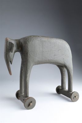 Quebec Folk Art Carved Elephant Pull Toy on Wheels. Quebec Folk Art Carved Wooden Elephant Pull 