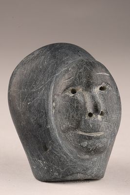 Inuit Soapstone sculpture of a portrait / Stone Carving Human Head. A small Inuit carving of a 