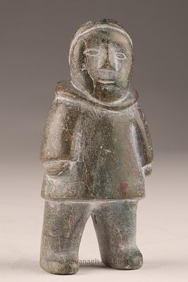 Inuit Soapstone Stone Carving, Standing Figure Sculpture. A small Inuit carving of a standing 