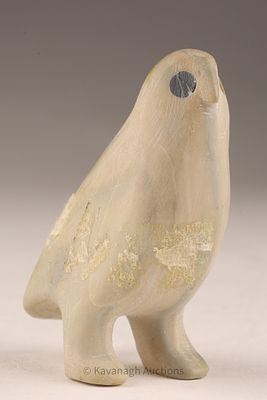 Inuit Stone Carving of a Standing Bird. Carved in a creamy beige stone with dark inlaid eyes 