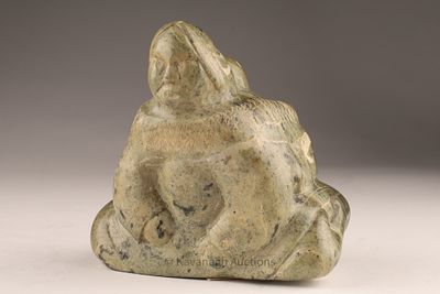 Annie Novalinga (Inuit, b. 1939) Stone Carving of a Seated Figure. Serpentine carving depicting 