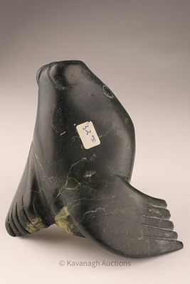 Inuit Stone Sculpture of a Stylized Bear. Stone carving, likely Cape Dorset Co-op, mid-20th 