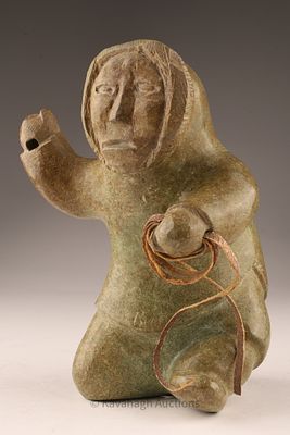 Signed Inuit Stone Carving, Hunter Figure with Raised Arm. Stone carving, Inuit, signed in 