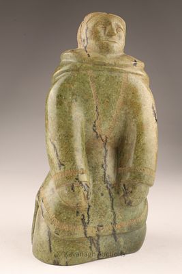 Inuit Carved Stone Figure of a Standing Person. A finely carved Inuit stone figure depicting a 