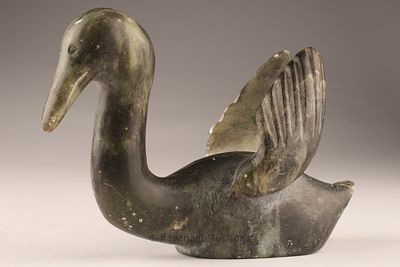 Edetoak Iyyittuaq (Inuit, mid-20th century) Stone carving of a bird. Stone carving of a stylized 