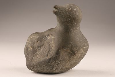 Inuit Stone Carving of a Bird. An unsigned hand-carved Inuit stone sculpture depicting a 