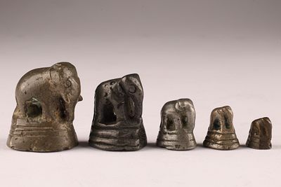 Set Antique Burmese Bronze Opium or Gold Weights Elephants. Largest measures 1.25 inches H.