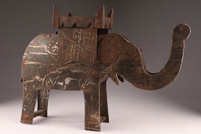 Folk Art Sheet-Metal Elephant Form Box, Early 20th Century. A striking folk art elephant-shaped 